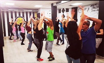 a picture of few couples dancing in the dance studio